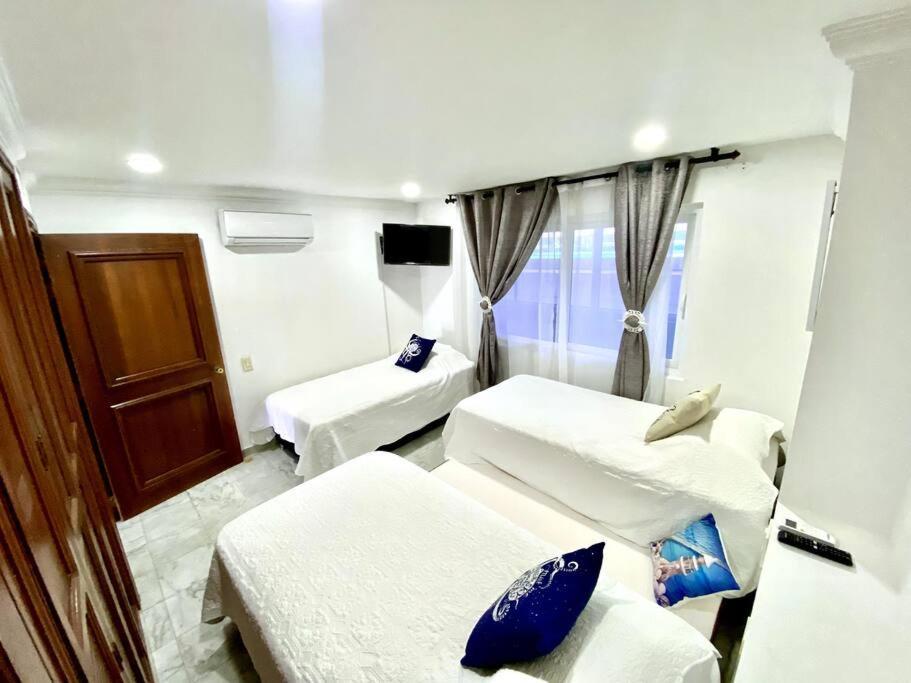 Exclusivos Apartamentos con playa privada San Andrés Habitación foto